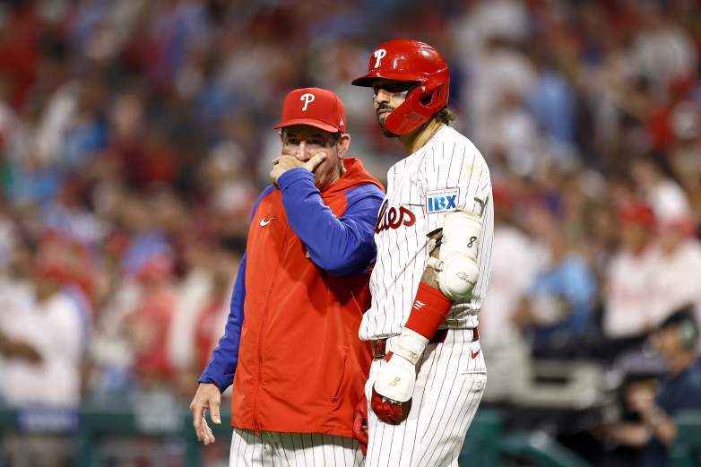 Former Philadelphia Phillies outfielder Nick Castellanos and ex-manager Rob Thomson.