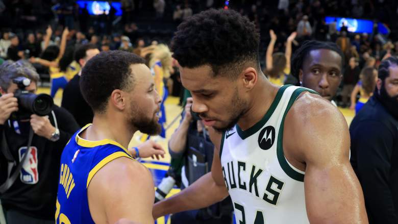 Stephen Curry and Giannis Antetokounmpo greet each other after a game amid Warriors trade speculation