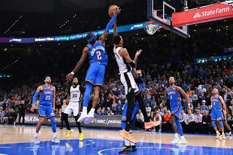 Shai Gilgeous-Alexander #2 of the Oklahoma City Thunder blocks a shot attempt by Victor Wembanyama