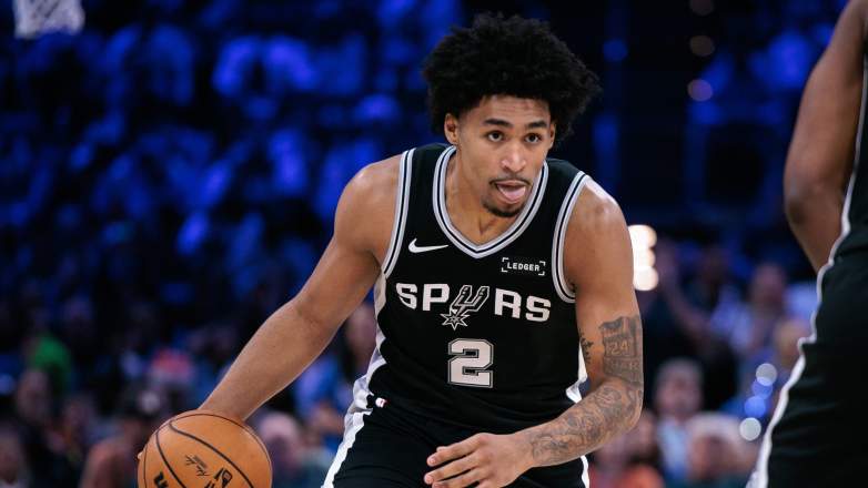 Dylan Harper dribbles during Spurs vs Thunder Game 1