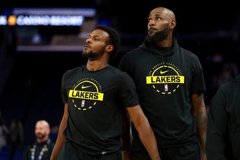 Los Angeles Lakers stars LeBron James and Bronny James during an NBA game.