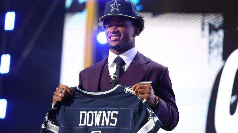 Caleb Downs of Ohio State celebrates after being selected eleventh overall pick by the Dallas Cowboys