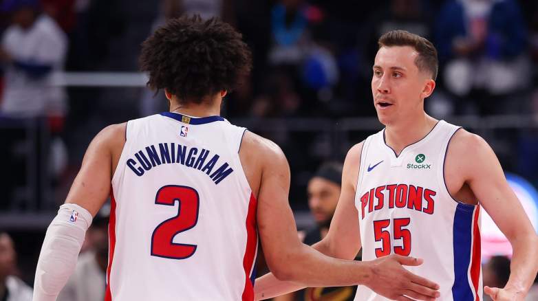 Cade Cunningham and Duncan Robinson celebrating during Pistons playoff game against Cavaliers