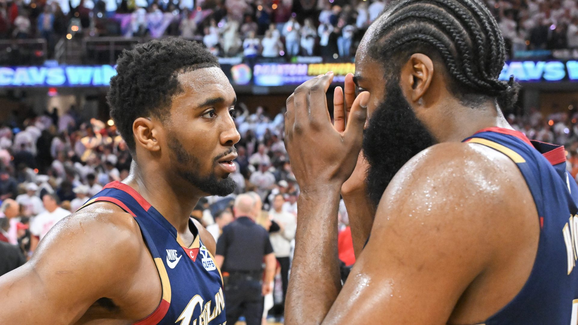 Donovan Mitchell talks with James Harden during Cavaliers playoff game amid contract and offseason uncertainty
