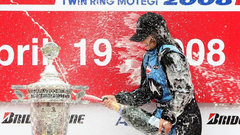 Danica Patrick sprays champagne after winning the 2008 Indy Japan 300 at Twin Ring Motegi