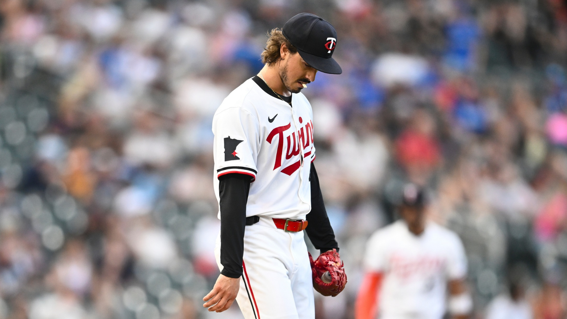 Joe Ryan #41 of the Minnesota Twins reacts after giving up a home run to Shea Langeliers #23 of the Athletics in the third inning of the game at Target Field on August 19, 2025 in Minneapolis, Minnesota. (Photo by Stephen Maturen/Getty Images)