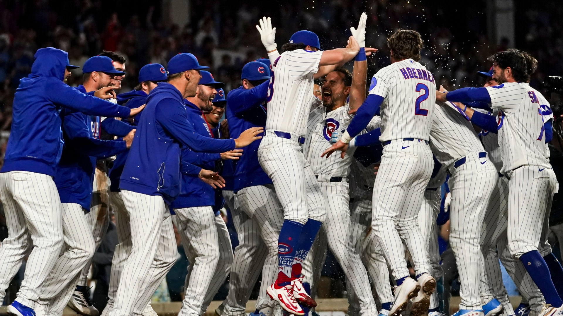 The Chicago Cubs celebrate Michael Conforto #20 after he hit a walk-off home run in the ninth inning against the Cincinnati Reds at Wrigley Field on May 04, 2026 in Chicago, Illinois. (Photo by Sage Zipeto/Getty Images)