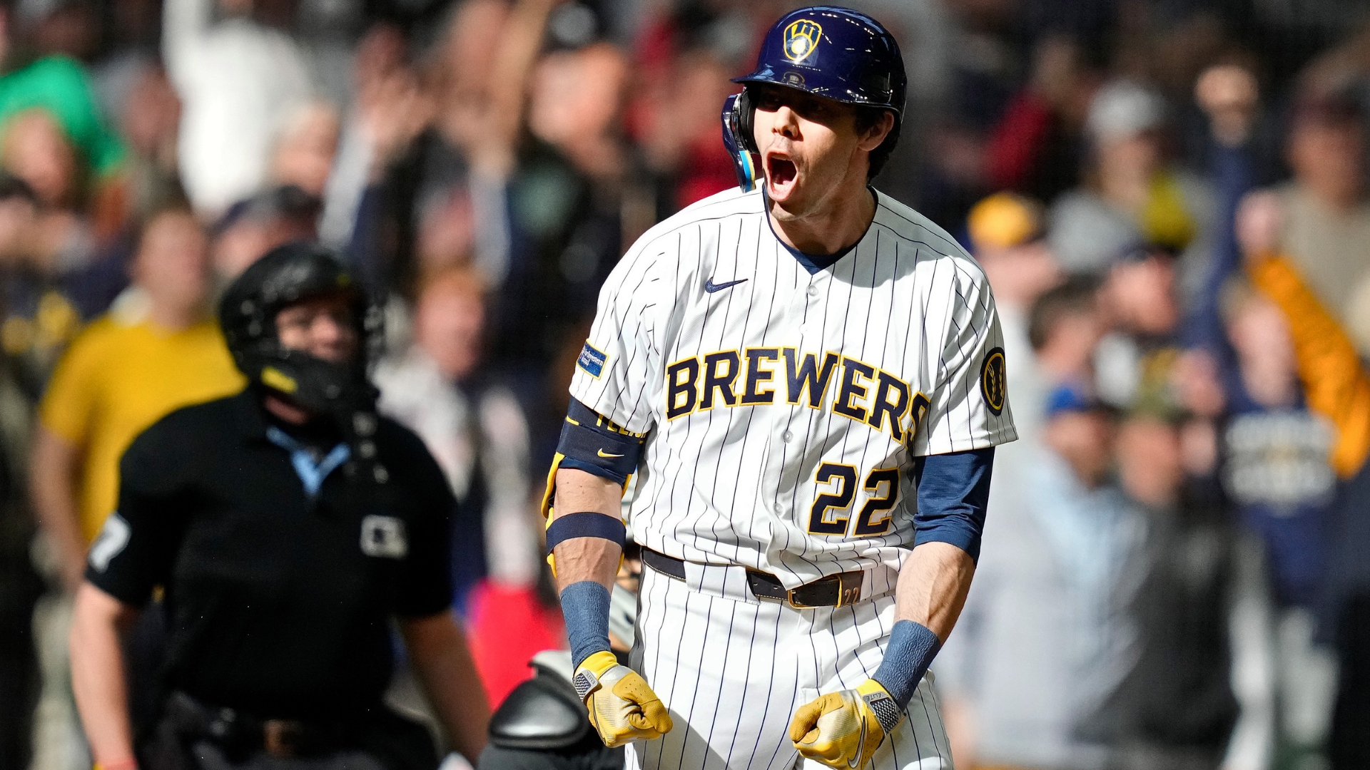 Christian Yelich #22 of the Milwaukee Brewers reacts after hitting a three-run homer to take the lead in the eighth inning against the Chicago White Sox at American Family Field on March 29, 2026 in Milwaukee, Wisconsin. (Photo by John Fisher/Getty Images)