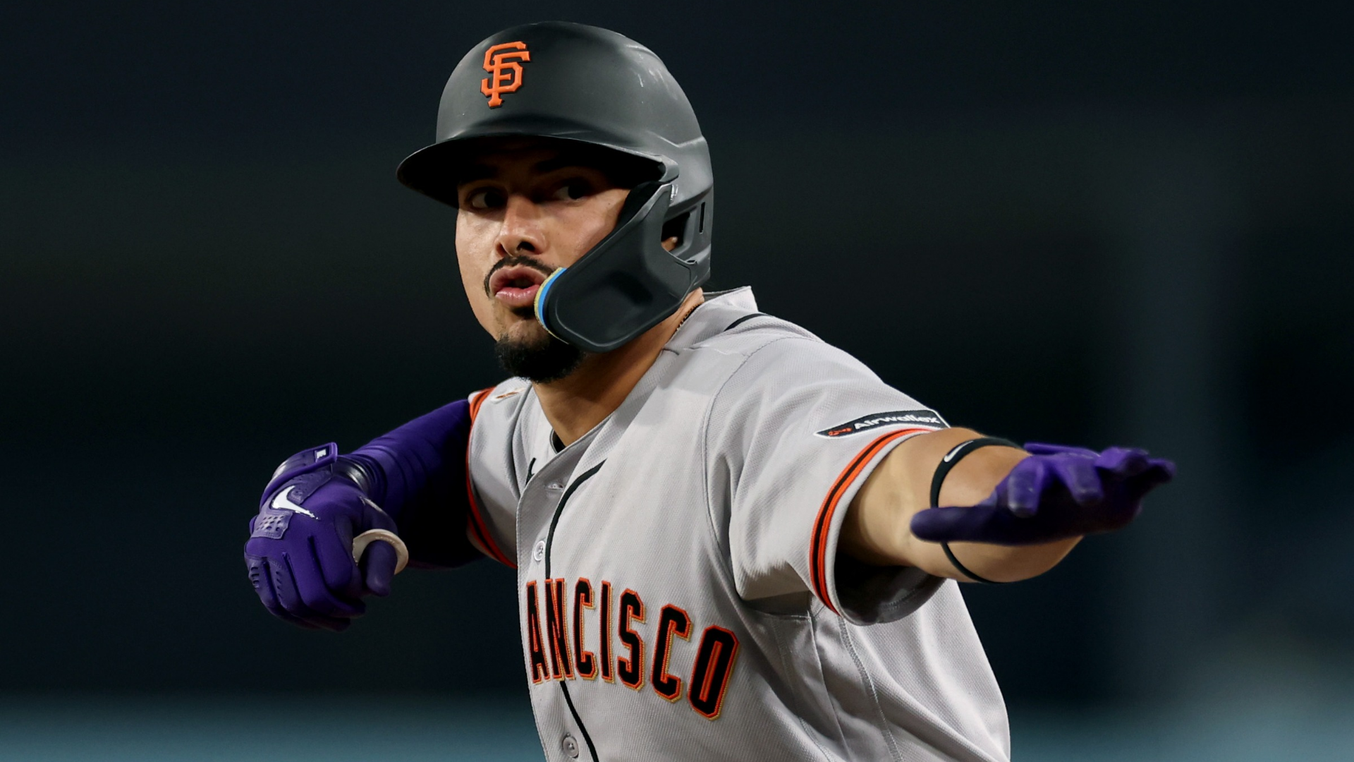 Willy Adames #2 of the San Francisco Giants celebrates his RBI single to score Casey Schmitt #10 and take a 7-3 lead over the Los Angeles Dodgers, during the ninth inning at Dodger Stadium on May 11, 2026 in Los Angeles, California. (Photo by Harry How/Getty Images)