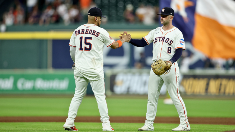 Isaac Paredes #15 and Christian Walker #8 of the Houston Astros celebrate after defeating the Seattle Mariners at Daikin Park on May 22, 2025 in Houston, Texas. (Photo by Alex Slitz/Getty Images)