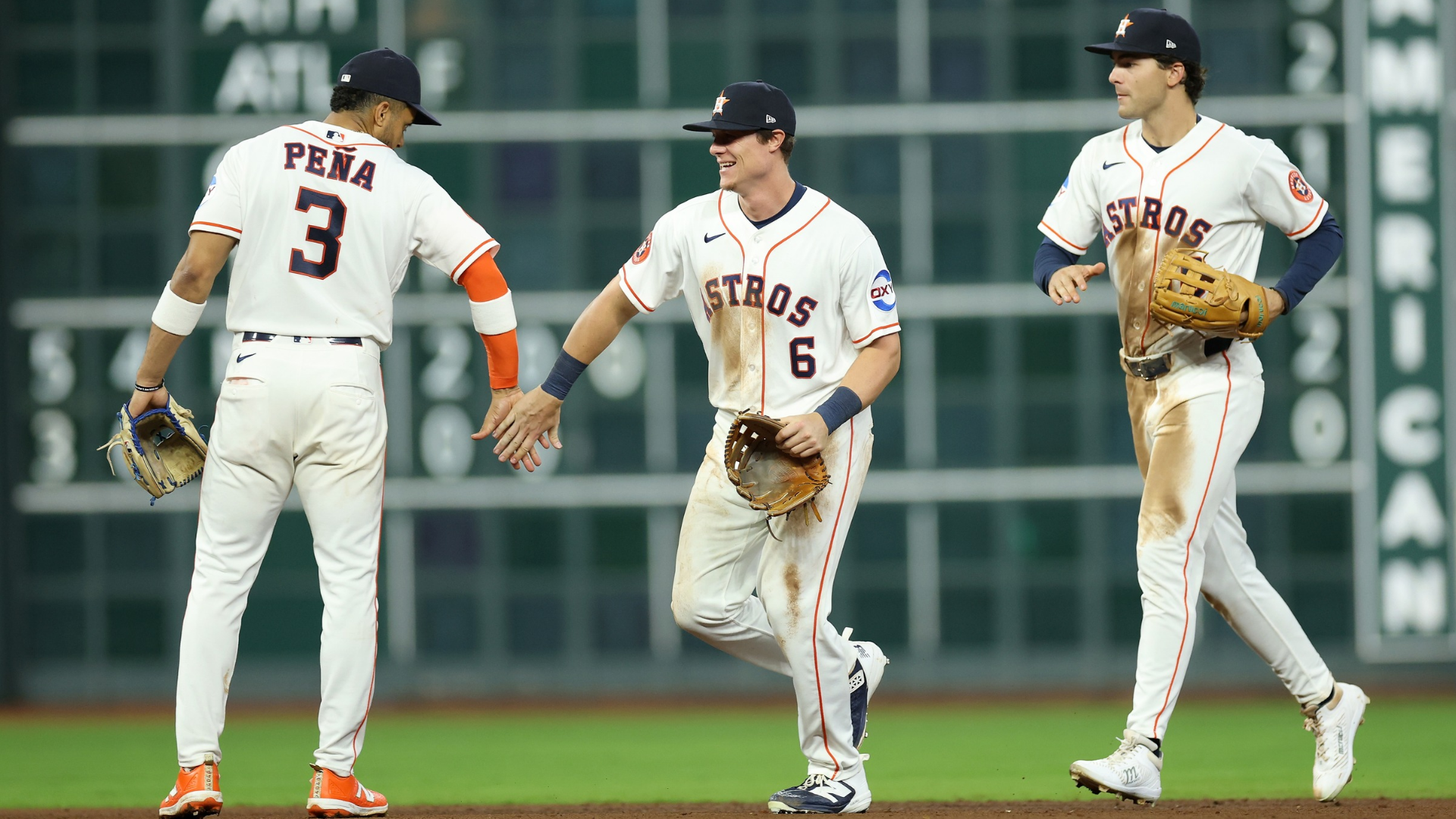 Jeremy Pena #3, Jake Meyers #6 and Joey Loperfido #10 of the Houston Astros celebrate after defeating the Boston Red Sox at Daikin Park on March 31, 2026 in Houston, Texas. (Photo by Tim Warner/Getty Images)