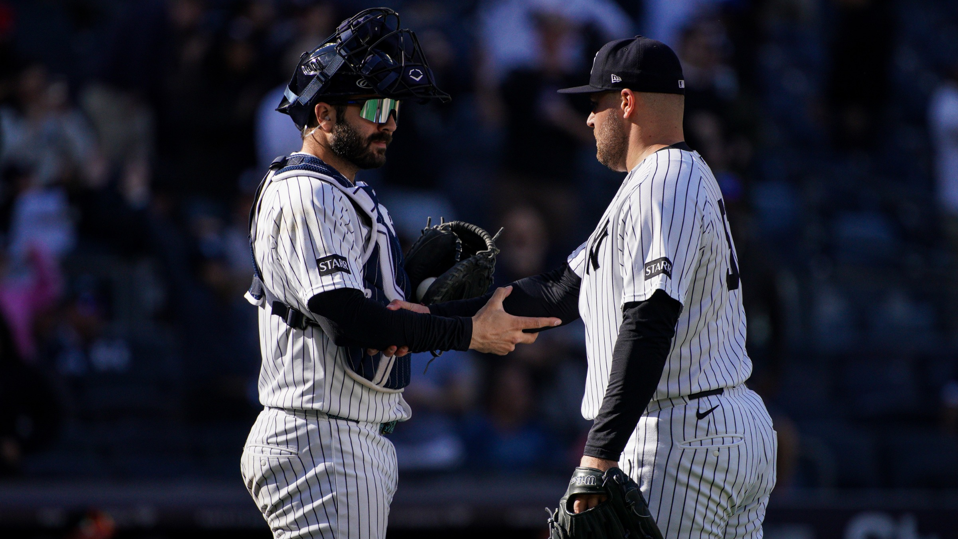 David Bednar #53 and Austin Wells #28 of the New York Yankees shake hands following their 11-3 win against the Baltimore Orioles at Yankee Stadium on May 03, 2026 in New York City. (Photo by Evan Bernstein/Getty Images)