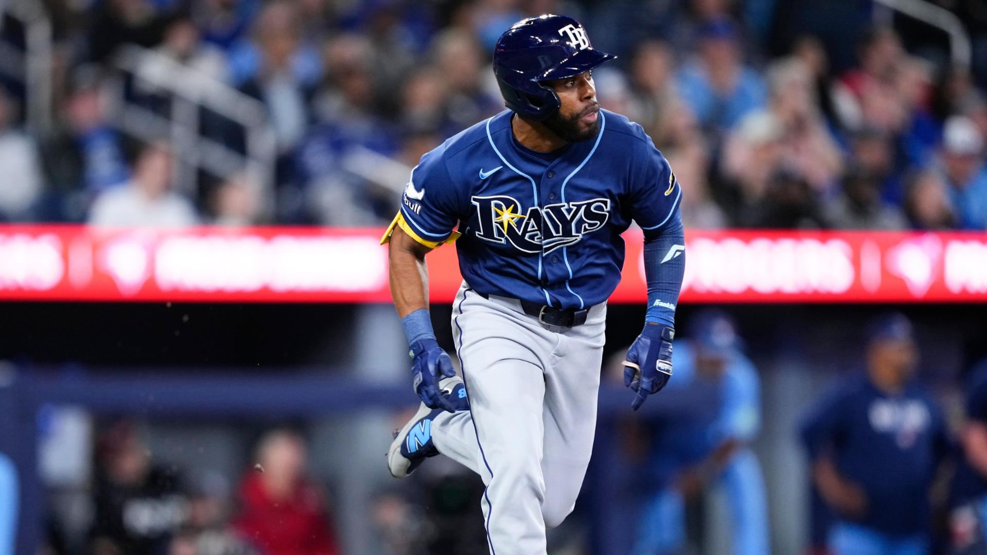 Cedric Mullins #31 of the Tampa Bay Rays runs to first on his two-RBI single against the Toronto Blue Jays during the third inningin their MLB game at the Rogers Centre on May 12, 2026 in Toronto, Ontario, Canada. (Photo by Mark Blinch/Getty Images)