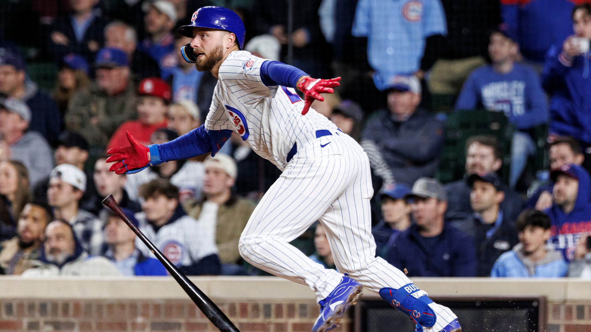Michael Busch #29 of the Chicago Cubs hits a walk-off RBI single in the tenth inning of a game between the Cincinnati Reds and the Chicago Cubs at Wrigley Field on May 05, 2026 in Chicago, Illinois. (Photo by Griffin Quinn/Getty Images)