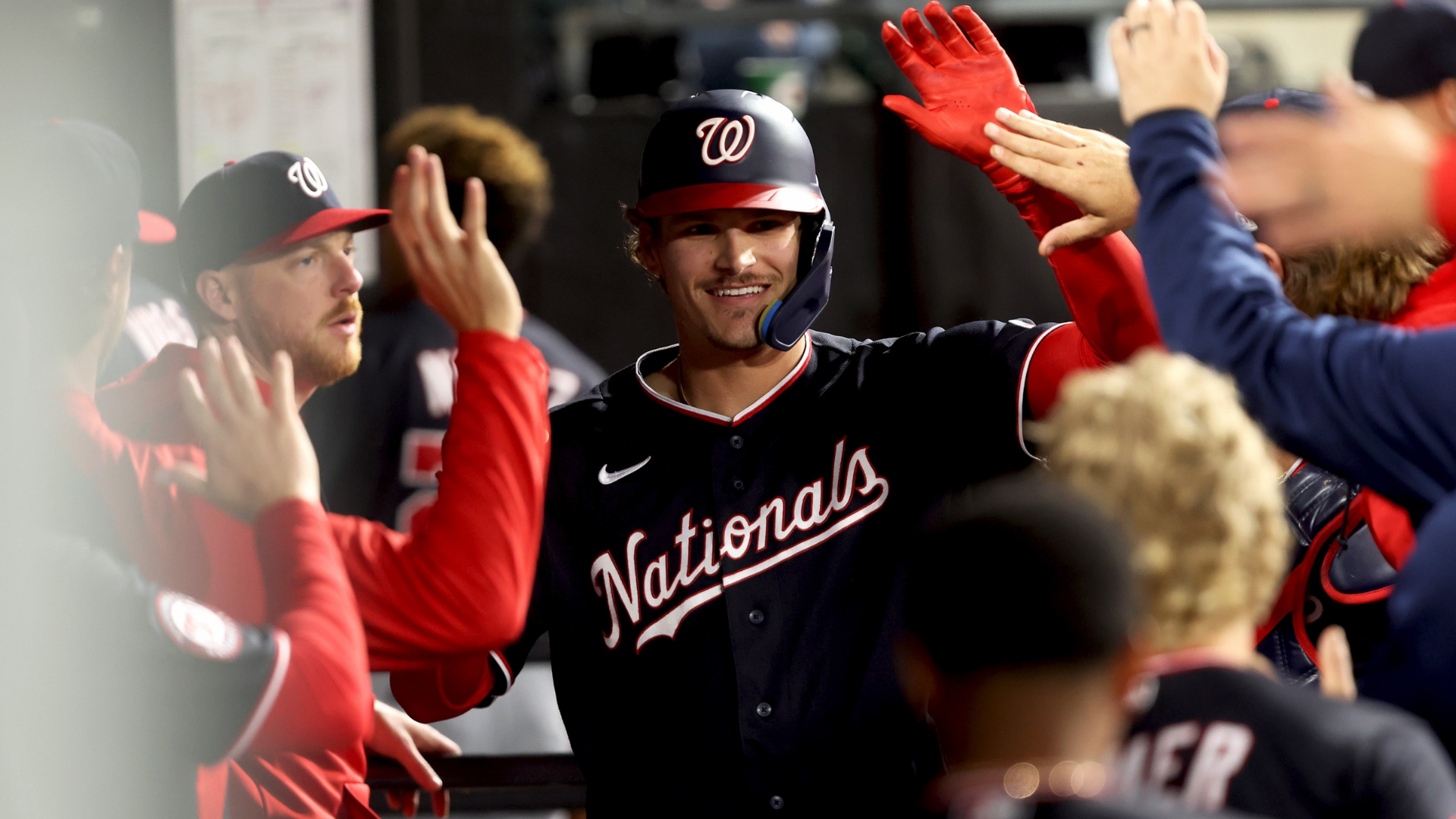 Brady House #12 of the Washington Nationals high-fives teammates after hitting a home run off of Jordan Leasure #49 of the Chicago White Sox during the eighth inning at Rate Field on April 24, 2026 in Chicago, Illinois. (Photo by Michael Hirschuber/Getty Images)