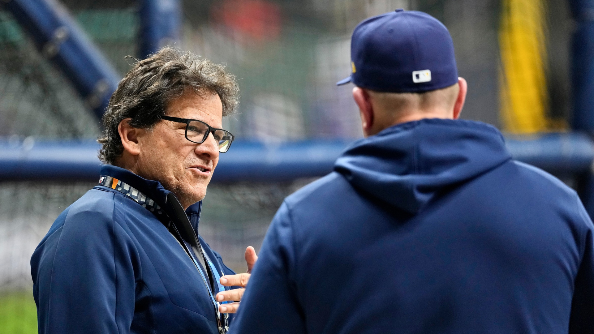 Milwaukee Brewers owner Mark Attanasio meets with manager Pat Murphy before game two of the National League Division Series against the Chicago Cubs at American Family Field on October 06, 2025 in Milwaukee, Wisconsin. (Photo by John Fisher/Getty Images)