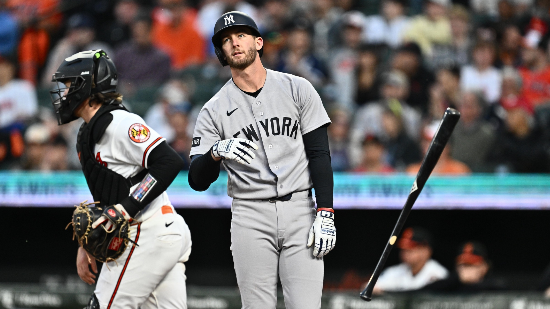 Ryan McMahon #19 of the New York Yankees flips his bat after striking out to end the fifth inning against the Baltimore Orioles at Oriole Park at Camden Yards on May 12, 2026 in Baltimore, Maryland. (Photo by Jamie Sabau/Getty Images)