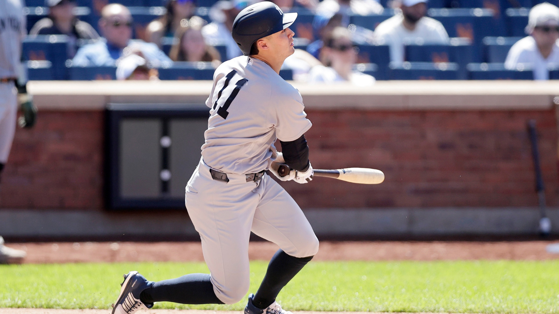 Anthony Volpe #11 of the New York Yankees follows through on his sixth inning two-run base hit against the New York Mets at Citi Field on May 17, 2026 in New York City. (Photo by Jim McIsaac/Getty Images)