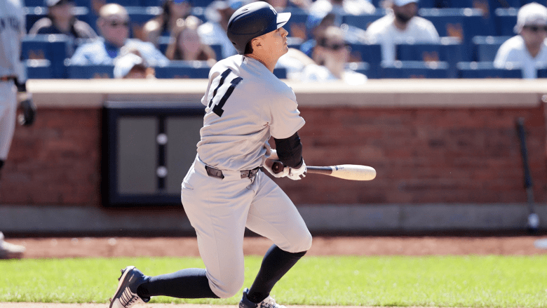 Anthony Volpe #11 of the New York Yankees follows through on his sixth inning two-run base hit against the New York Mets at Citi Field on May 17, 2026 in New York City. (Photo by Jim McIsaac/Getty Images)