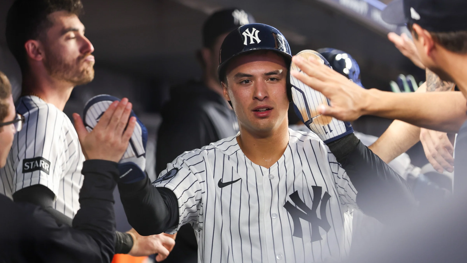 Anthony Volpe #11 of the New York Yankees celebrates in the dugout after scoring during the fourth inning against the Toronto Blue Jays at Yankee Stadium on May 18, 2026 in the Bronx borough of New York City. (Photo by Ishika Samant/Getty Images)