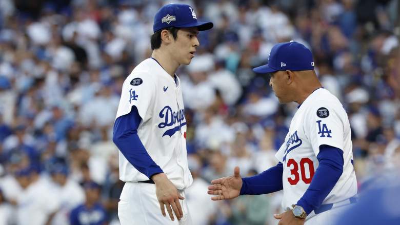 Los Angeles Dodgers pitcher Roki Sasaki and manager Dave Roberts