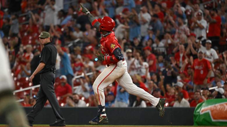 St. Louis Cardinals right field Jordan Walker points to a section of shirtless fans in right field after hitting a two-run home run against the Kansas City Royals at Busch Stadium as part of MLB's Rivalry Weekend.