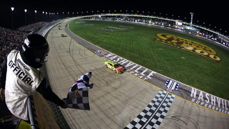 Ryan Blaney, driver of the #12 Menards/Cardell Cabinetry Ford, takes the checkered flag.