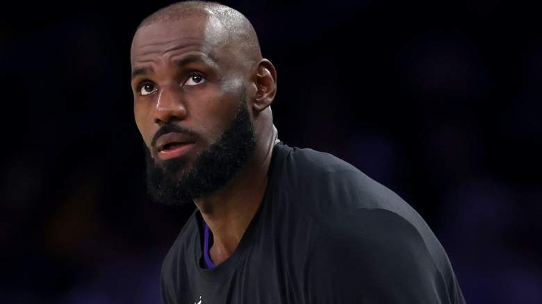 LeBron James looks on during a Los Angeles Lakers game amid speculation linking him to the Boston Celtics ahead of NBA free agency.