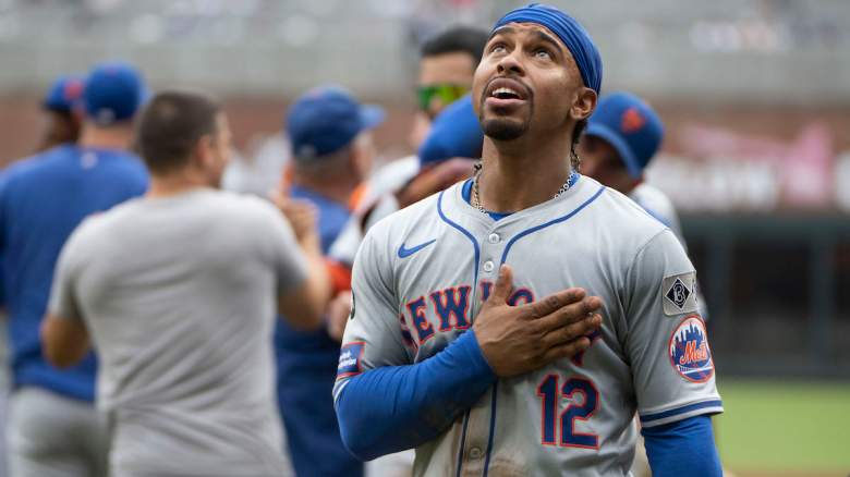 Francisco Lindor looks skyward during pregame warmups as the New York Mets announced an injury update before facing the Cincinnati Reds.