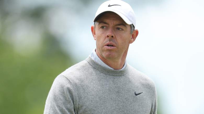 Rory McIlroy looks on during practice at Aronimink after revealing he is wearing special shoes following a ripped-off toenail and burst blister.