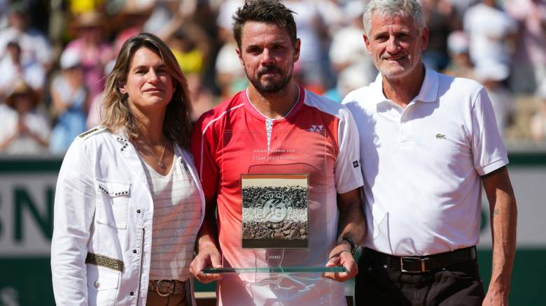 Switzerland's Stan Wawrinka poses with a trophy at the French Open.