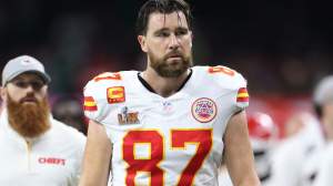 Travis Kelce #87 of the Kansas City Chiefs walks off the field.