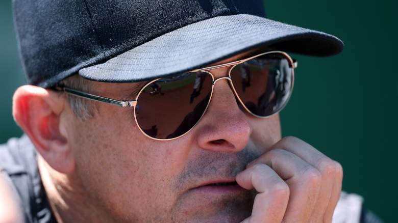 Manager Aaron Boone #17 of the New York Yankees watches from the dugout.