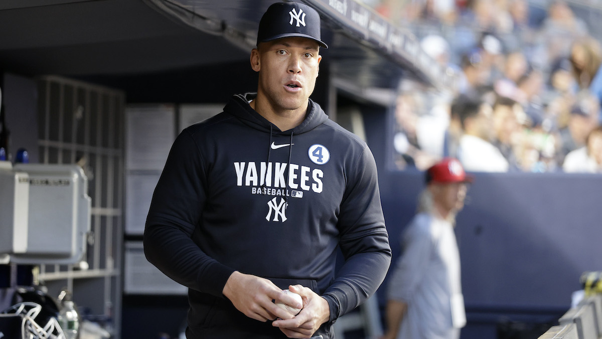 Aaron Judge watches from the dugout.