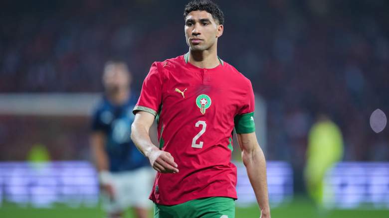 Achraf Hakimi of Morocco looks on.