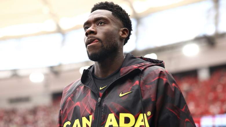 Alphonso Davies #19 of Canada walks.