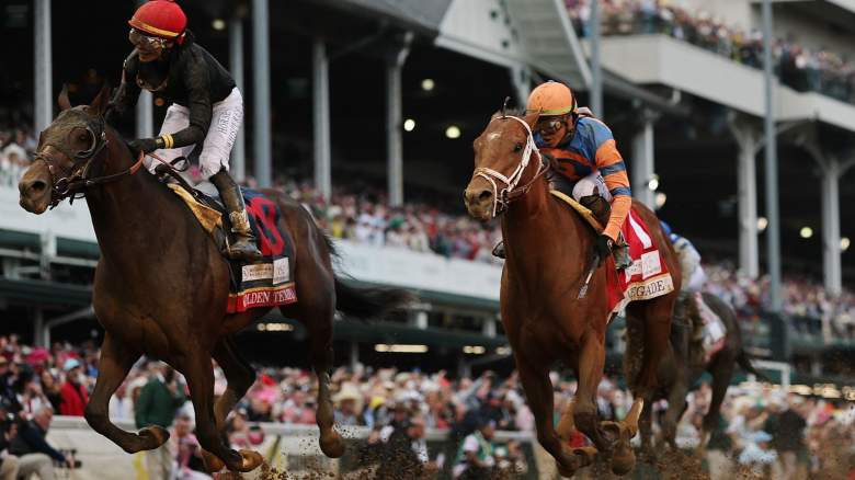 Golden Tempo #19, ridden by jockey Jose Ortiz, crosses the finish line to win the 152nd running of the Kentucky Derby past Renegade #1, ridden by jockey Irad Ortiz Jr., at Churchill Downs on May 02, 2026 in Louisville, Kentucky