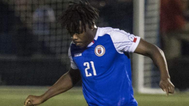 Bryan Alceus (21) of the Haiti National Football Team fights for the ball.