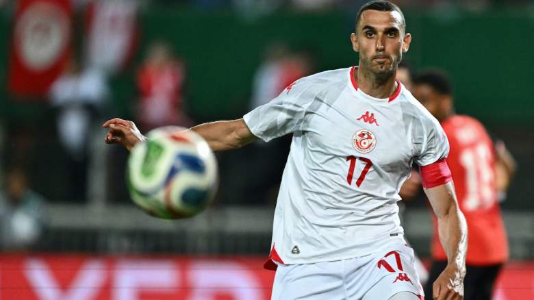 Tunisia's midfielder #17 Ellyes Skhiri eyes the ball.