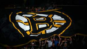 Boston Bruins fans hold a giant flag with the Boston Logo on it prior Game Six of the 2013 NHL Stanley Cup Final against the Chicago Blackhawks at TD Garden on June 24, 2013 in Boston, Massachusetts.