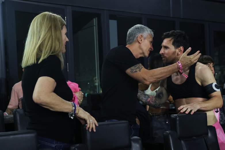 Lionel Messi greets his parents, Jorge Messi and Celia Cuccittini