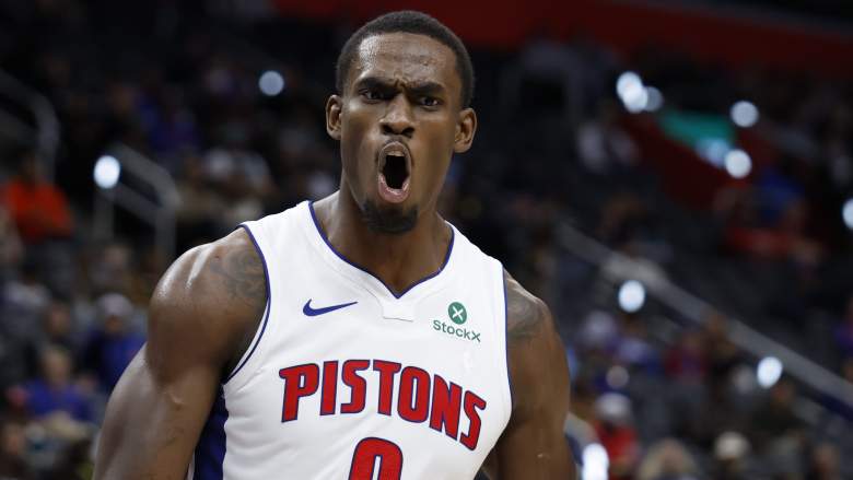 Detroit Pistons center Jalen Duren reacts during an NBA game, shouting after a play while wearing the team's white uniform.