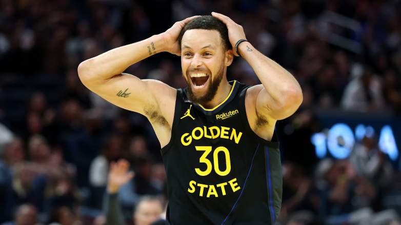 Stephen Curry reacts during a Golden State Warriors game after signing a reported $400 million endorsement deal with Li-Ning.