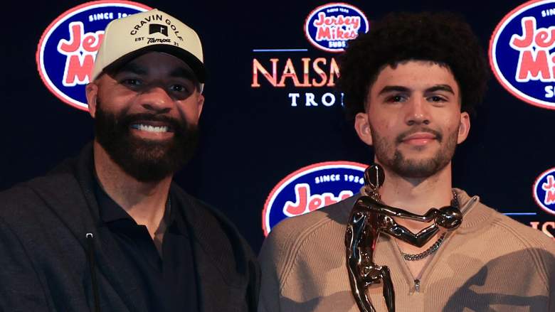 Cameron Boozer #12 of the Duke Blue Devils and NBA draft candidate, poses with his father Carlos Boozer.