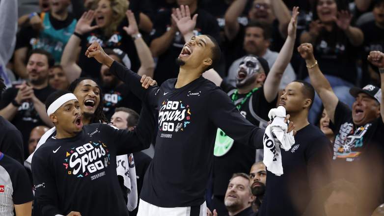 Victor Wembanyama celebrates with Spurs teammates after San Antonio secured a spot in the 2026 NBA Finals.