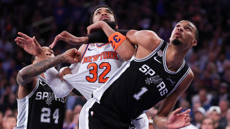 San Antonio Spurs center Victor Wembanyama fights for rebounding position against New York Knicks center Karl-Anthony Towns during Game 4 of the 2026 NBA Finals at Madison Square Garden.