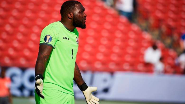 Haiti's goalkeeper Johny Placide looks on.