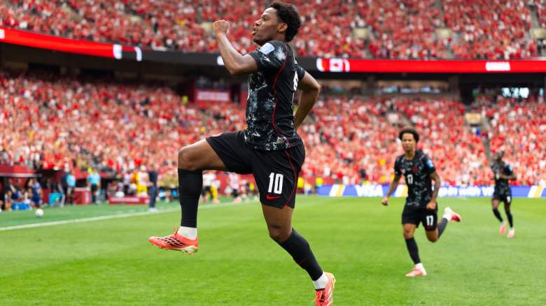 Jonathan David of Canada celebrates.
