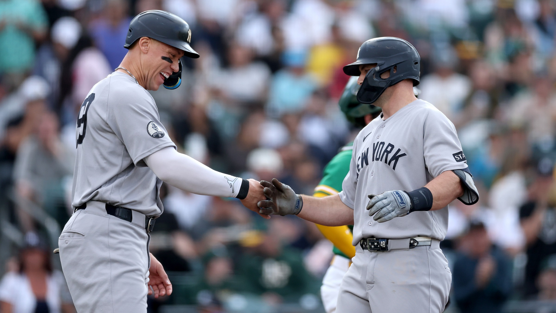 Aaron Judge #99 congratulates Paul Goldschmidt #48 of the New York Yankees after he hit a home run against the Athletics in the first inning at Sutter Health Park on May 29, 2026 in Sacramento, California. (Photo by Ezra Shaw/Getty Images)