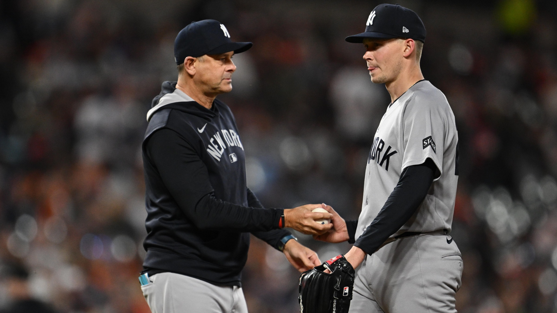 Starting pitcher Will Warren #29 of the New York Yankees is pulled by Manager Aaron Boone #17 in the sixth inning against the Baltimore Orioles at Oriole Park at Camden Yards on May 12, 2026 in Baltimore, Maryland. (Photo by Jamie Sabau/Getty Images)